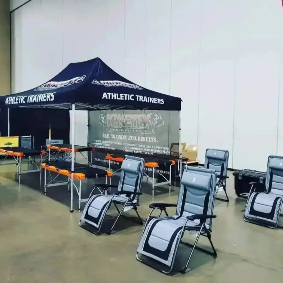 Kinetix athletic training tent at outdoor event